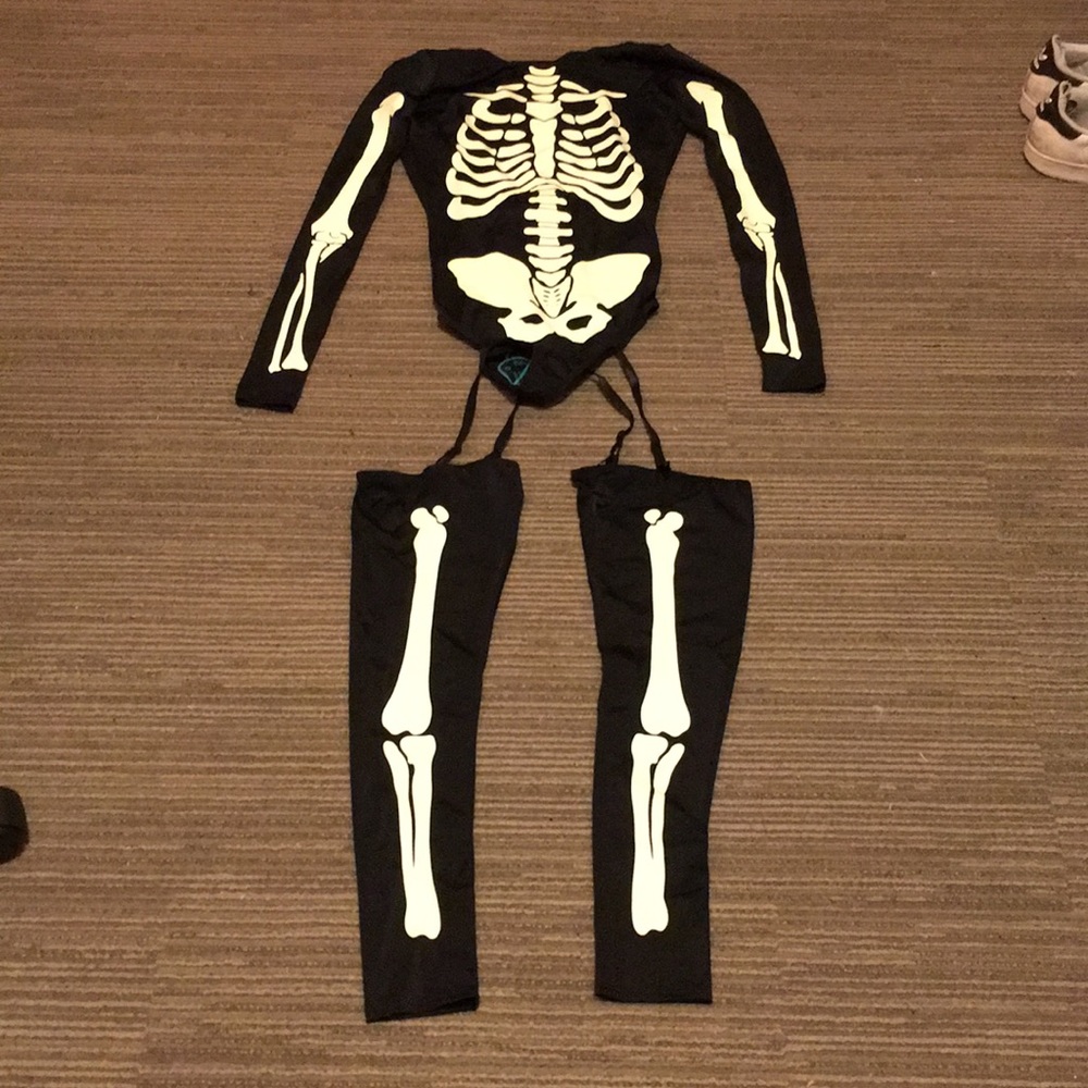 Skeleton body suit & thigh highs from Dolls Kill